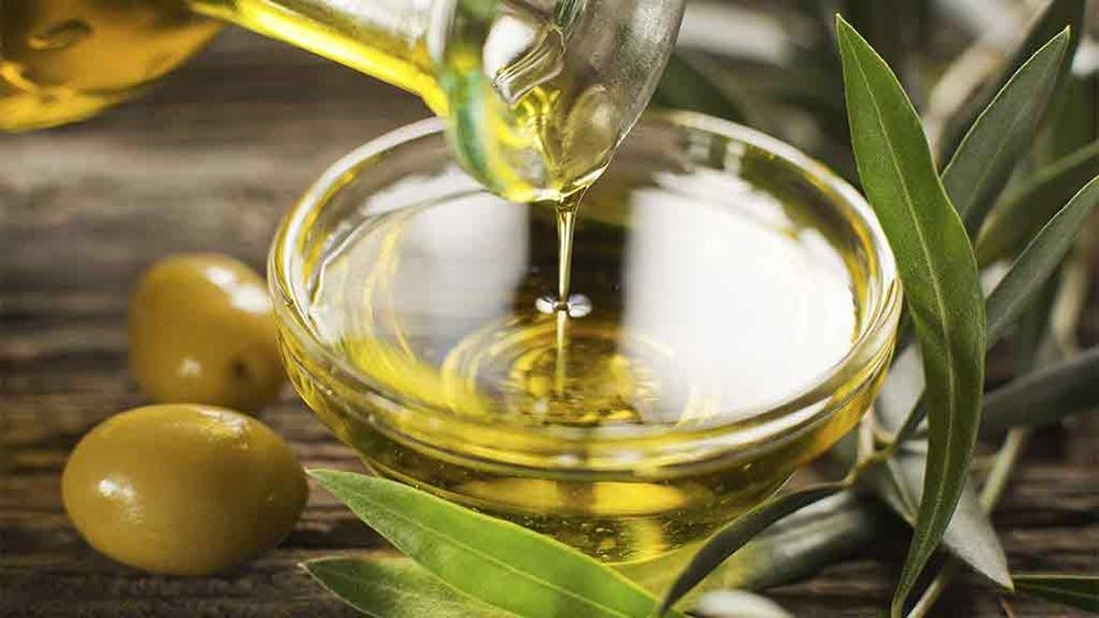 olive-oil-being-poured-into-a-bowl