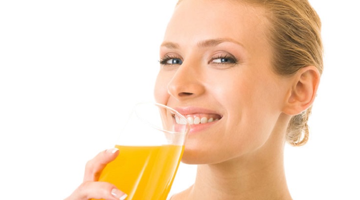 woman-drinking-orange-juice