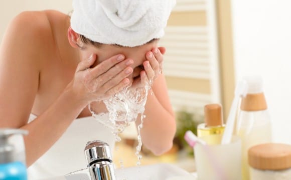 Woman washing Face
