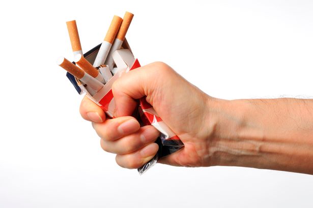 Isolated-shot-of-broken-cigarettes-on-white-background